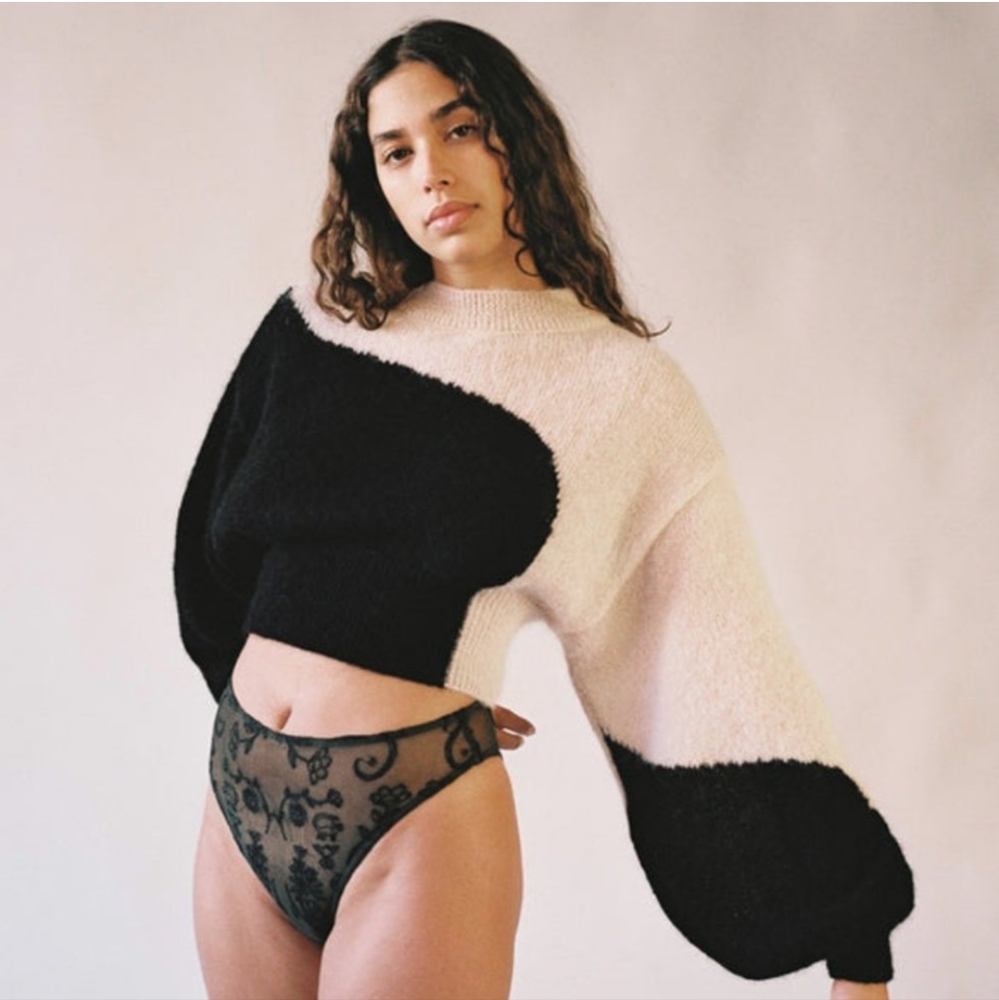 Chic Black and Cream Sweater with Lace Detail